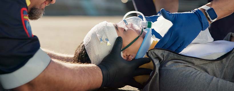 Patient receiving TBI/Concussion Screenings in Baldwin for auto accident injury pain relief